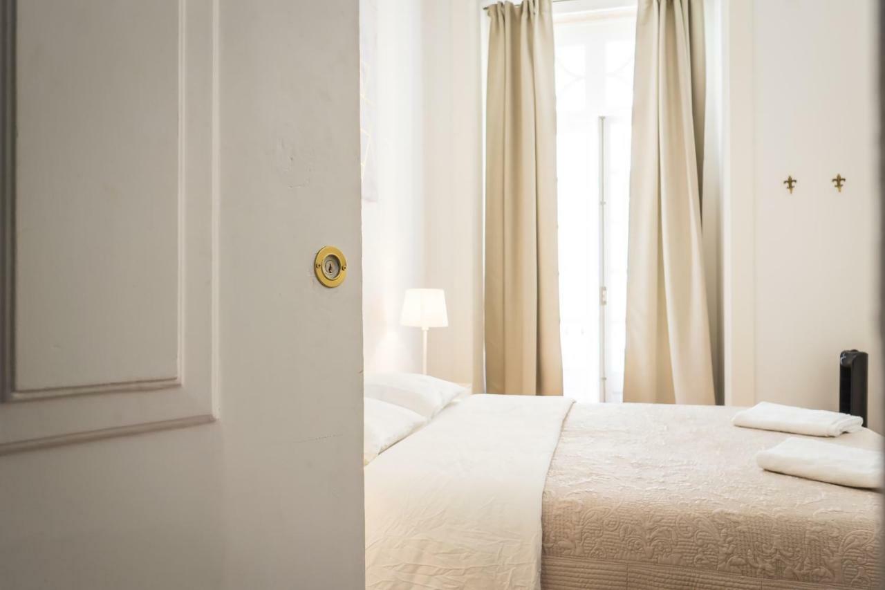 Santa Justa Prime Guesthouse Lisbon Bagian luar foto